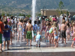 Kids playing at the splash pad