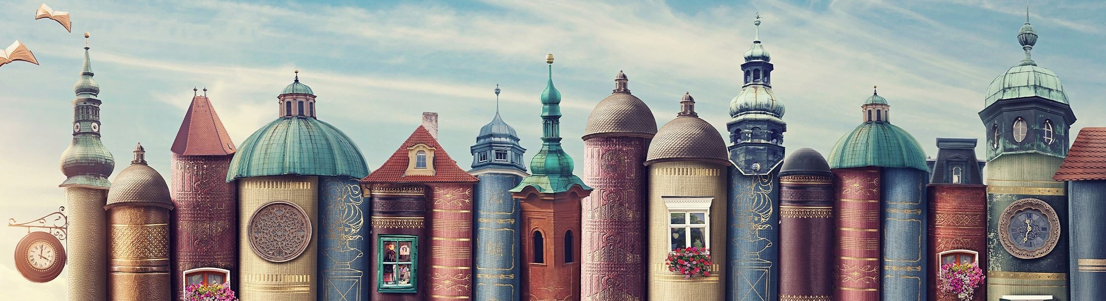 Image of books transformed into fantasy houses.